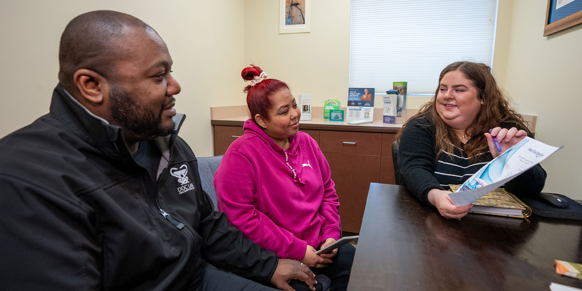 team member going over insurance and financial options with patient